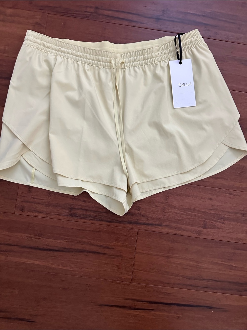 CALIA by Carrie Underwood Pale Yellow Layered Athletic Shorts